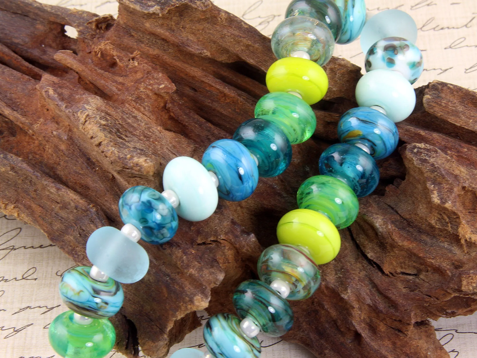 24 Handmade Blue Lagoon Lampwork Beads SRA