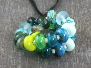 24 Handmade Blue Lagoon Lampwork Beads SRA